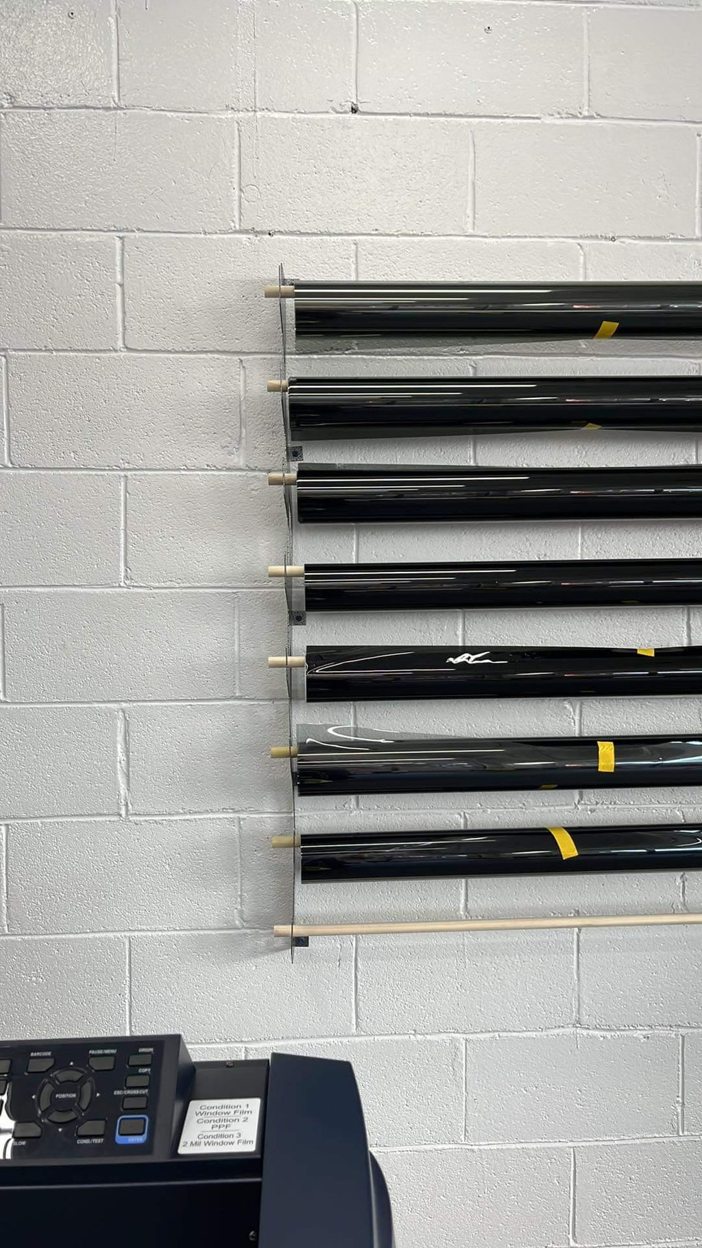 Wall-Mounted Vinyl, Tint, Paper & Cloth Wrap Rack - Modular Storage | Martin Metalwork"