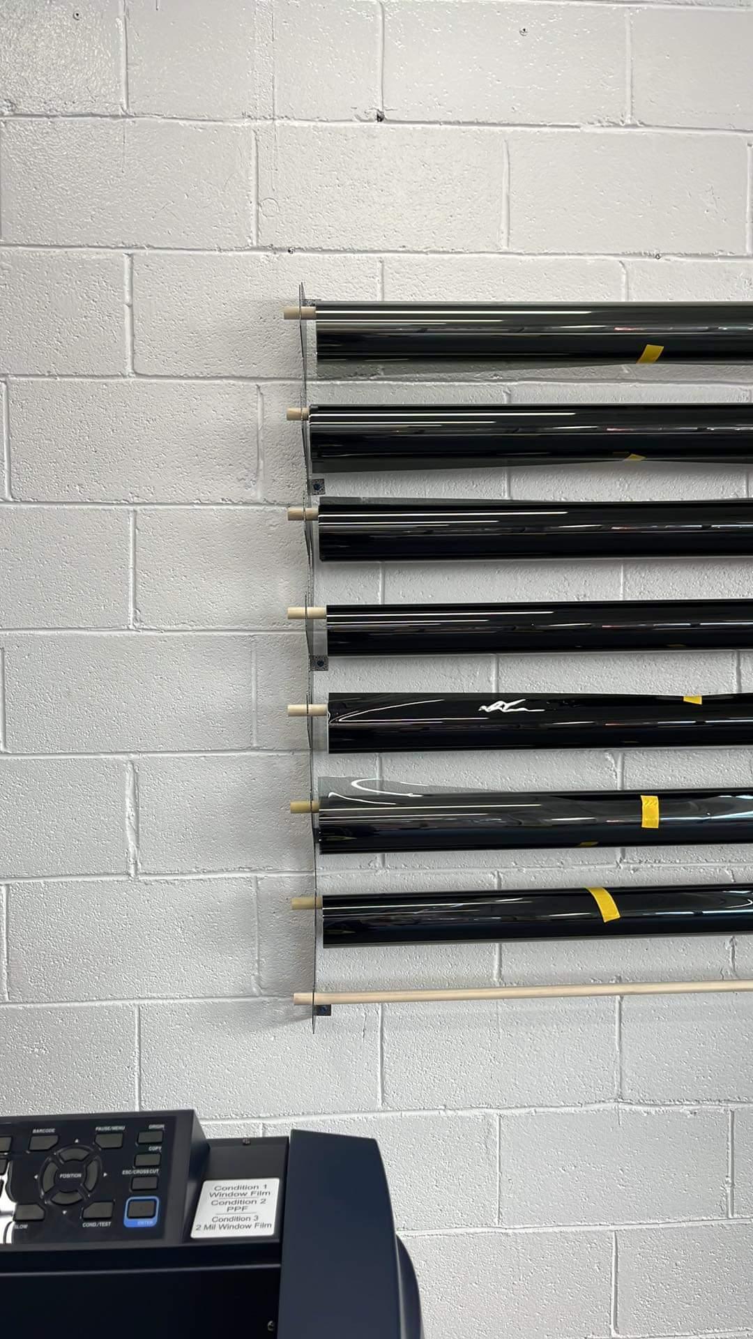 Wall-Mounted Vinyl, Tint, Paper & Cloth Wrap Rack - Modular Storage | Martin Metalwork"